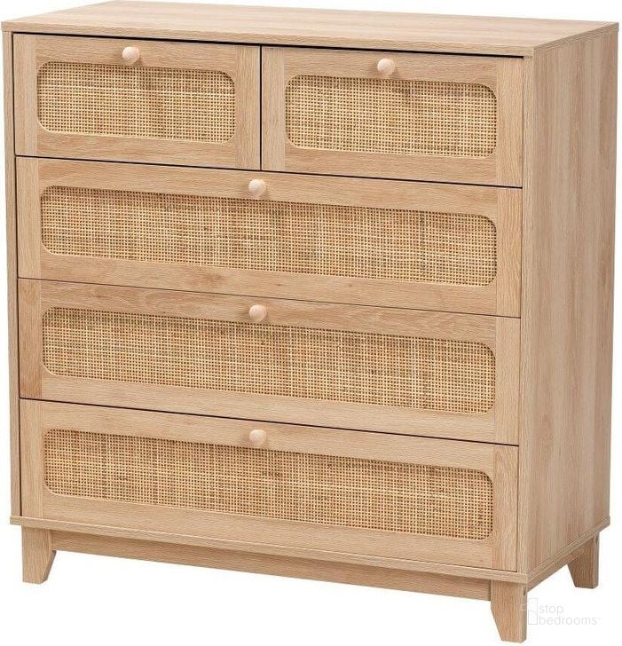 The appearance of Baxton Studio Elsbeth Mid Century Modern Oak Brown Finished Wood and Natural Rattan 5 Drawer Storage Cabinet designed by Baxton Studio in the transitional interior design. This brown oak piece of furniture  was selected by 1StopBedrooms from Elsbeth Collection to add a touch of cosiness and style into your home. Sku: LC22040704-Rattan-5DW Cabinet. Material: Wood. Product Type: Storage Cabinet. Image1