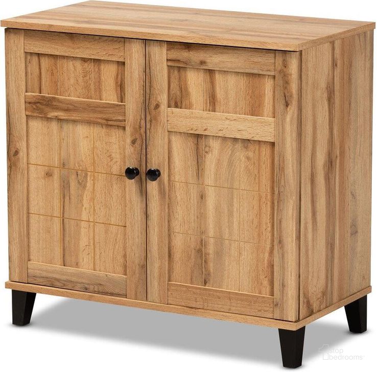 The appearance of Baxton Studio Glidden Modern And Contemporary Oak Brown Finished Wood 2-Door Shoe Storage Cabinet designed by Baxton Studio in the modern / contemporary interior design. This black piece of furniture  was selected by 1StopBedrooms from Glidden Collection to add a touch of cosiness and style into your home. Sku: FP-1201-Wotan Oak. Product Type: Storage Cabinet. Material: MDF. Image1