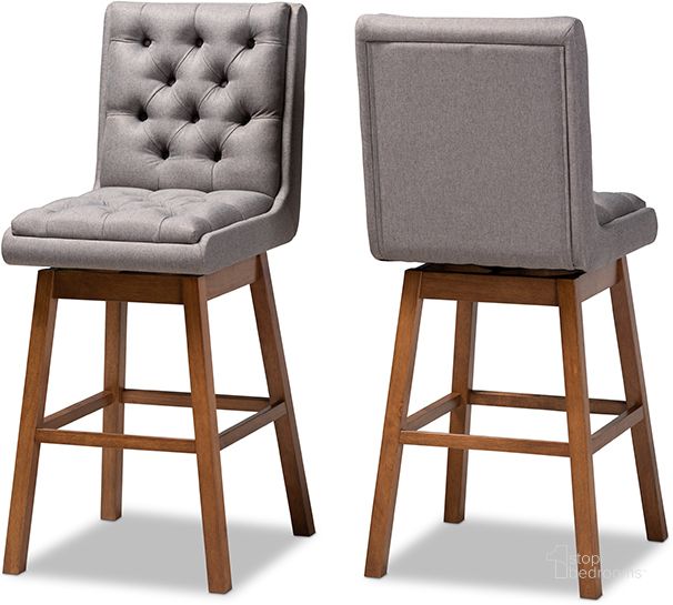 The appearance of Baxton Studio Gregory Modern Transitional Grey Fabric Upholstered and Walnut Brown Finished Wood 2-Piece Swivel Bar Stool Set designed by Baxton Studio in the modern / contemporary interior design. This gray/brown piece of furniture  was selected by 1StopBedrooms from Gregory Collection to add a touch of cosiness and style into your home. Sku: BBT5372-Grey/Walnut-BS. Material: Polyester. Product Type: Barstool. Image1