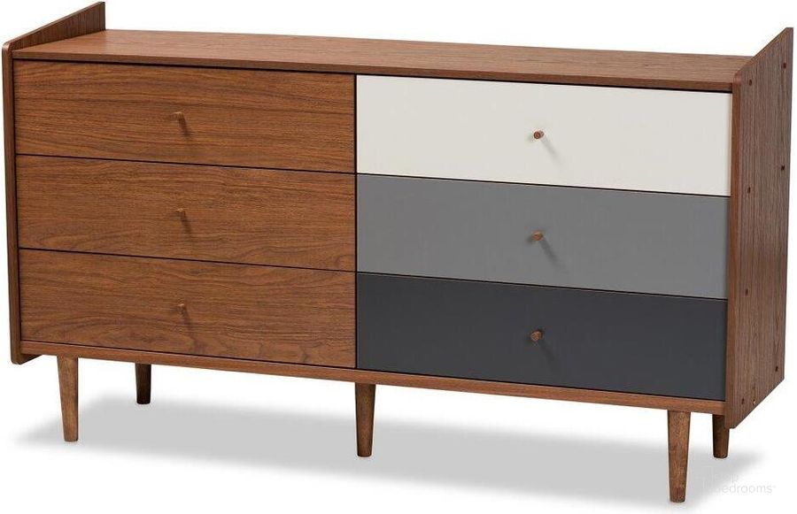 The appearance of Baxton Studio Halden Mid Century Modern Multicolor Walnut Brown And Grey Gradient Finished Wood 6 Drawer Dresser designed by Baxton Studio in the transitional interior design. This walnut brown piece of furniture  was selected by 1StopBedrooms from Halden Collection to add a touch of cosiness and style into your home. Sku: FP-11020-Grey/Walnut-6DW-Dresser. Product Type: Dresser. Material: Rubberwood. Image1