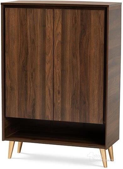 The appearance of Baxton Studio Landen Mid-Century Modern Walnut Brown and Gold Finished Wood 2-Door Entryway Shoe storage Cabinet designed by Baxton Studio in the transitional interior design. This walnut brown piece of furniture  was selected by 1StopBedrooms from Landen Collection to add a touch of cosiness and style into your home. Sku: LV10SC10151WI-Columbia/Gold-Shoe Cabinet. Material: MDF. Product Type: Shoe Cabinet. Image1