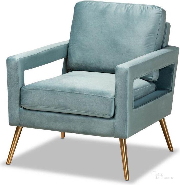 The appearance of Baxton Studio Leland Glam And Luxe Light Blue Velvet Fabric Upholstered And Gold Finished Armchair designed by Baxton Studio in the glam interior design. This light blue piece of furniture  was selected by 1StopBedrooms from Leland Collection to add a touch of cosiness and style into your home. Sku: TSF-6729-Light Blue/Gold-CC. Product Type: Arm Chair. Material: MDF. Image1