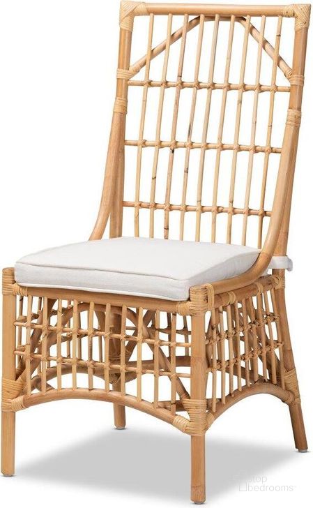 The appearance of Baxton Studio Rose Modern Bohemian White Fabric Upholstered and Natural Brown Rattan Dining Chair designed by Baxton Studio in the coastal interior design. This natural brown piece of furniture  was selected by 1StopBedrooms from Rose Collection to add a touch of cosiness and style into your home. Sku: Rose-Rattan-DC No Arm. Product Type: Dining Chair. Material: Cotton. Image1