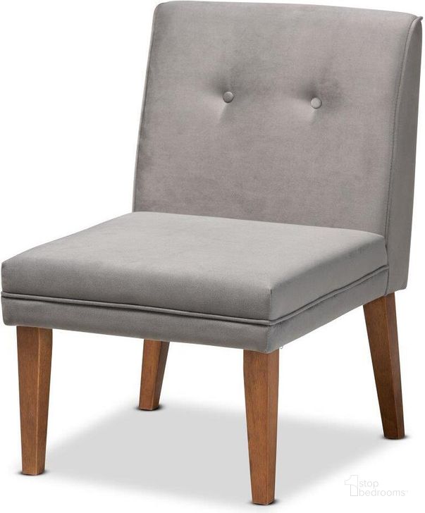 The appearance of Baxton Studio Stewart Mid-Century Modern Grey Velvet Upholstered And Walnut Brown Finished Wood Dining Chair designed by Baxton Studio in the transitional interior design. This grey piece of furniture  was selected by 1StopBedrooms from Stewart Collection to add a touch of cosiness and style into your home. Sku: BBT8062-Grey Velvet/Walnut-CC. Product Type: Dining Chair. Material: Rubberwood. Image1