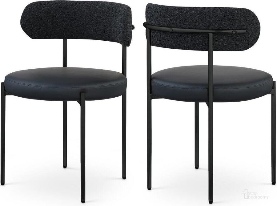 The appearance of Beacon Black Faux Leather And Boucle Fabric Dining Chair Set of 2 881Black-C designed by Meridian in the modern / contemporary interior design. This black piece of furniture  was selected by 1StopBedrooms from Beacon Collection to add a touch of cosiness and style into your home. Sku: 881Black-C. Product Type: Dining Chair. Material: Iron. Image1