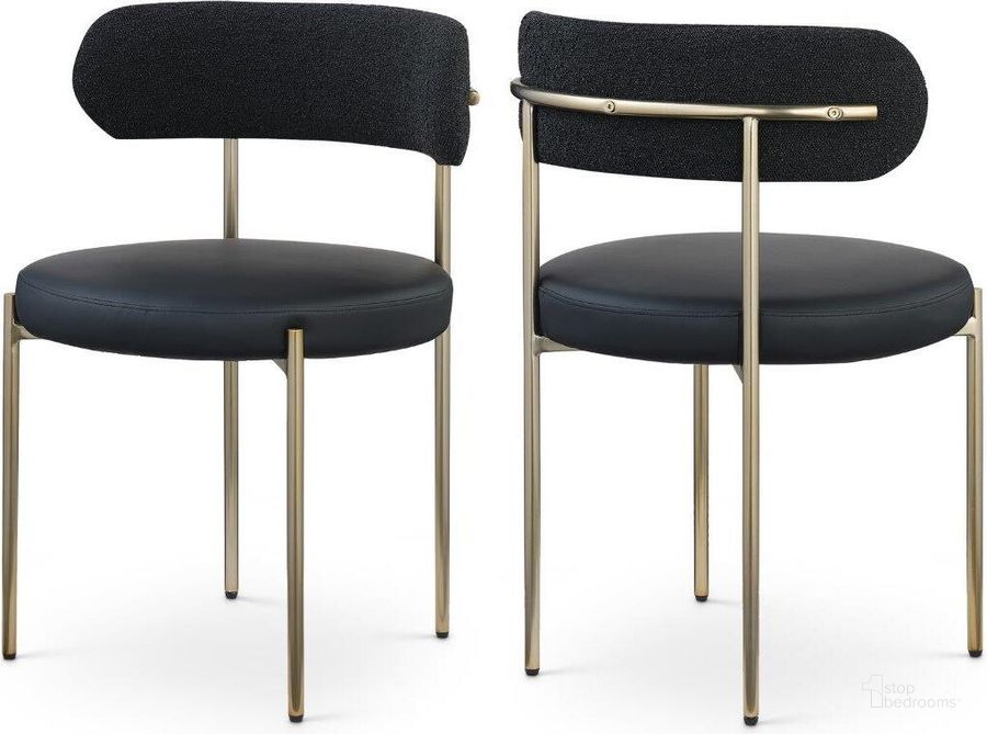 The appearance of Beacon Black Faux Leather And Boucle Fabric Dining Chair Set of 2 886Black-C designed by Meridian in the modern / contemporary interior design. This black and gold piece of furniture  was selected by 1StopBedrooms from Beacon Collection to add a touch of cosiness and style into your home. Sku: 886Black-C. Product Type: Dining Chair. Material: Iron. Image1