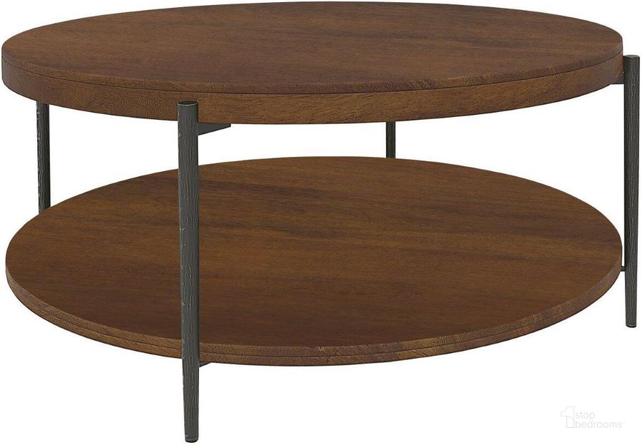 The appearance of Bedford Park Tobacco Occassion Round Mango Coffee Table designed by Hekman in the transitional interior design. This dark brown piece of furniture  was selected by 1StopBedrooms from Bedford Park Collection to add a touch of cosiness and style into your home. Sku: 26002. Product Type: Coffee Table.