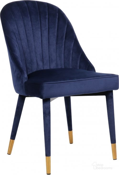 The appearance of Belle Navy Dining Chair Set of 2 designed by Meridian in the modern / contemporary interior design. This navy velvet piece of furniture  was selected by 1StopBedrooms from Belle Collection to add a touch of cosiness and style into your home. Sku: 811Navy-C. Product Type: Dining Chair. Material: Velvet. Image1