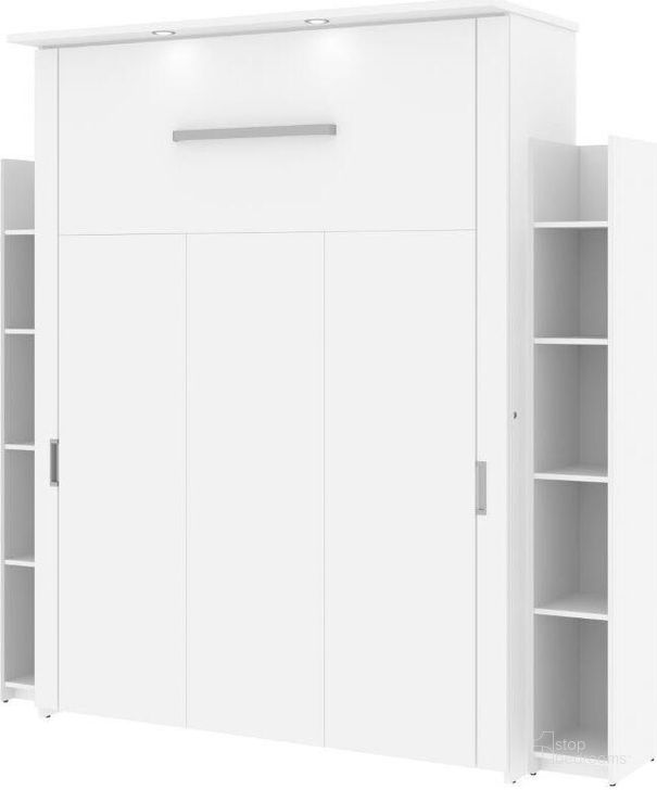 The appearance of Bestar Lumina Queen Murphy Bed With 2 Shelving Units In White designed by Bestar in the modern / contemporary interior design. This white piece of furniture  was selected by 1StopBedrooms from Lumina Collection to add a touch of cosiness and style into your home. Sku: 85885-17. Material: Wood. Bed Size: Queen. Bed Type: Murphy Bed. Product Type: Murphy Bed. Image1