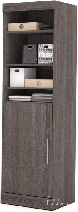The appearance of Nebula Bark Gray 25" Storage Unit with Door designed by Bestar in the modern / contemporary interior design. This gray piece of furniture  was selected by 1StopBedrooms from Nebula Collection to add a touch of cosiness and style into your home. Sku: 25162-47. Material: Wood. Product Type: Armoire. Image1