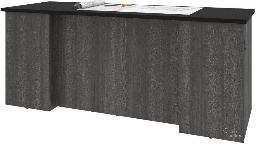 The appearance of Bestar Norma Desk Shell - Black and Bark Gray designed by Bestar in the modern / contemporary interior design. This black piece of furniture  was selected by 1StopBedrooms from Norma Collection to add a touch of cosiness and style into your home. Sku: 181400-000018. Material: Wood. Product Type: Desk Shell. Image1