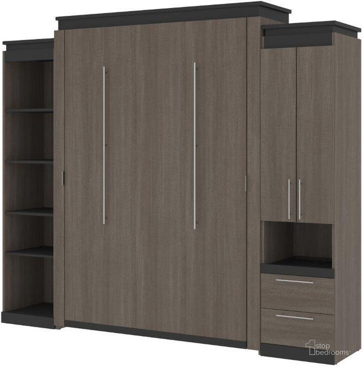 The appearance of Bestar Orion 104W Queen Murphy Bed With Narrow Storage Solutions In Bark Gray And Graphite designed by Bestar in the modern / contemporary interior design. This bark gray piece of furniture  was selected by 1StopBedrooms from Orion Collection to add a touch of cosiness and style into your home. Sku: 116871-000047. Material: Wood. Bed Size: Queen. Bed Type: Murphy Bed. Product Type: Murphy Bed. Image1