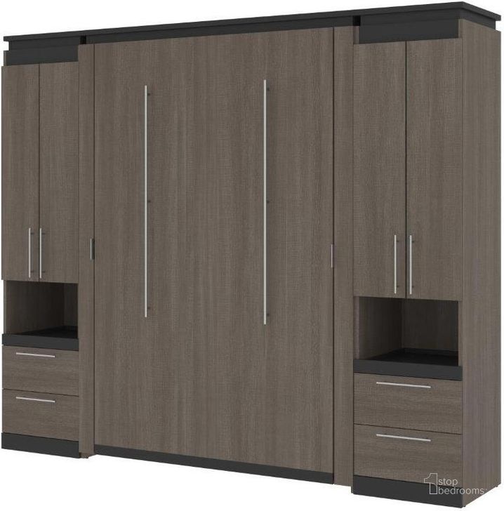 The appearance of Bestar Orion 98W Full Murphy Bed And 2 Storage Cabinets With Pull-Out Shelves In Bark Gray And Graphite designed by Bestar in the modern / contemporary interior design. This bark gray piece of furniture  was selected by 1StopBedrooms from Orion Collection to add a touch of cosiness and style into your home. Sku: 116899-000047. Material: Wood. Bed Size: Full. Bed Type: Murphy Bed. Product Type: Murphy Bed. Image1