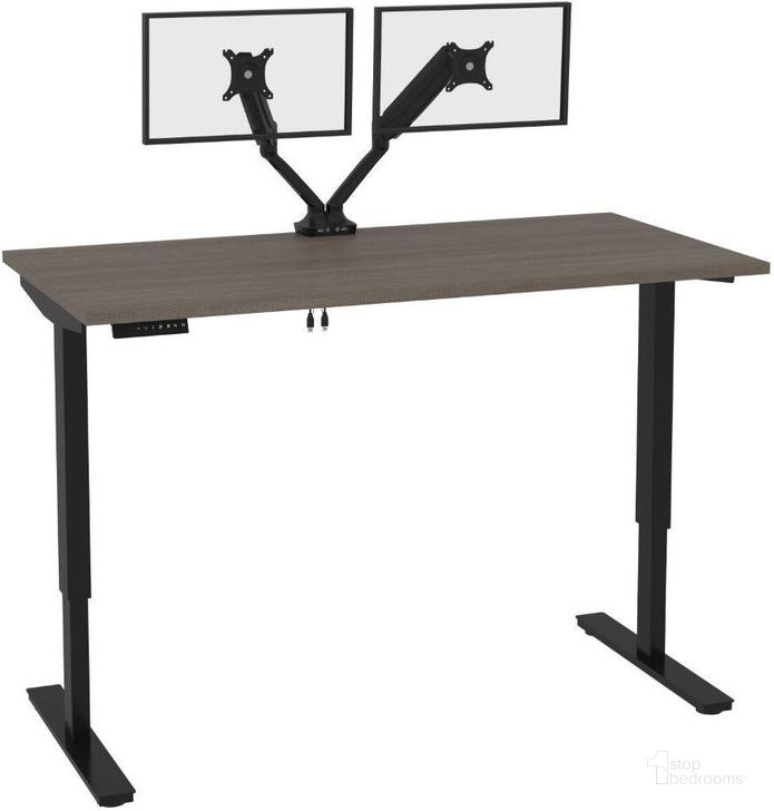 The appearance of Bestar Universel Standing Desk With Dual Monitor Arm In Bark Grey 165870-000047 designed by Bestar in the modern / contemporary interior design. This grey piece of furniture  was selected by 1StopBedrooms from Universel Collection to add a touch of cosiness and style into your home. Sku: 165870-000047. Material: Wood. Product Type: Desk. Image1