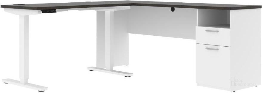 The appearance of Bestar Upstand 72W L-Shaped Electric Standing Desk In Deep Grey & White designed by Bestar in the modern / contemporary interior design. This white and gray piece of furniture  was selected by 1StopBedrooms from Upstand Collection to add a touch of cosiness and style into your home. Sku: 175852-000032. Material: Wood. Product Type: Desk. Image1