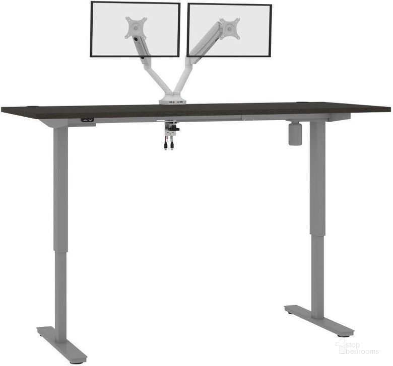 The appearance of Bestar Upstand Standing Desk With Dual Monitor Arm In Deep Grey 175880-000032 designed by Bestar in the modern / contemporary interior design. This deep grey piece of furniture  was selected by 1StopBedrooms from Upstand Collection to add a touch of cosiness and style into your home. Sku: 175880-000032. Material: Wood. Product Type: Desk. Image1