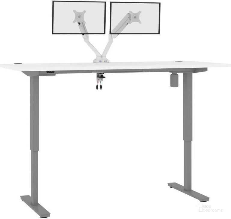 The appearance of Bestar Upstand Standing Desk With Dual Monitor Arm In White 175880-000017 designed by Bestar in the modern / contemporary interior design. This white piece of furniture  was selected by 1StopBedrooms from Upstand Collection to add a touch of cosiness and style into your home. Sku: 175880-000017. Material: Wood. Product Type: Desk. Image1