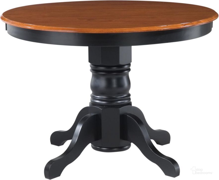 The appearance of Bishop Black Pedestal Table designed by Homestyles in the traditional interior design. This black piece of furniture  was selected by 1StopBedrooms from Bishop Collection to add a touch of cosiness and style into your home. Sku: 5168-301;5168-302. Table Top Shape: Round. Material: Wood. Product Type: Pedestal Table. Size: 42". Image1