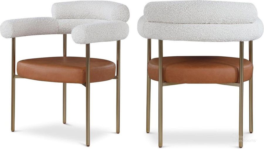 The appearance of Blake Cognac Faux Leather And Cream Boucle Fabric Dining Chair Set of 2 designed by Meridian in the modern / contemporary interior design. This cognac piece of furniture  was selected by 1StopBedrooms from Blake Collection to add a touch of cosiness and style into your home. Sku: 870Cognac-C. Product Type: Dining Chair. Material: Iron. Image1