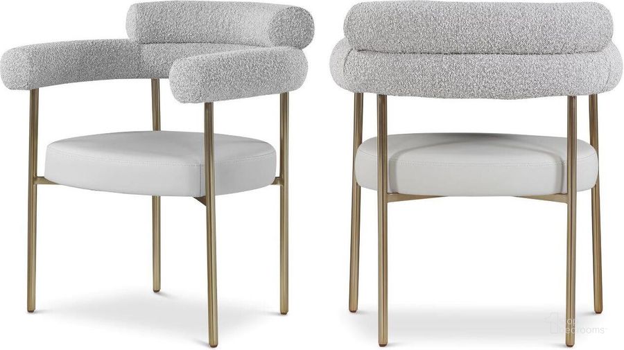 The appearance of Blake Taupe Faux Leather And Boucle Fabric Dining Chair Set of 2 designed by Meridian in the modern / contemporary interior design. This taupe piece of furniture  was selected by 1StopBedrooms from Blake Collection to add a touch of cosiness and style into your home. Sku: 870Taupe-C. Product Type: Dining Chair. Material: Iron. Image1