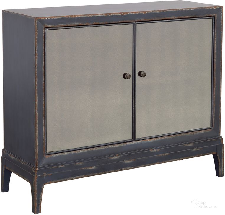 The appearance of Boone Textured Dark Blue Two Door Cabinet With Smoked Glass Inlay designed by Coast to Coast in the country / farmhouse interior design. This blue piece of furniture  was selected by 1StopBedrooms from Boone Collection to add a touch of cosiness and style into your home. Sku: 90327. Product Type: Cabinet. Material: MDF. Image1