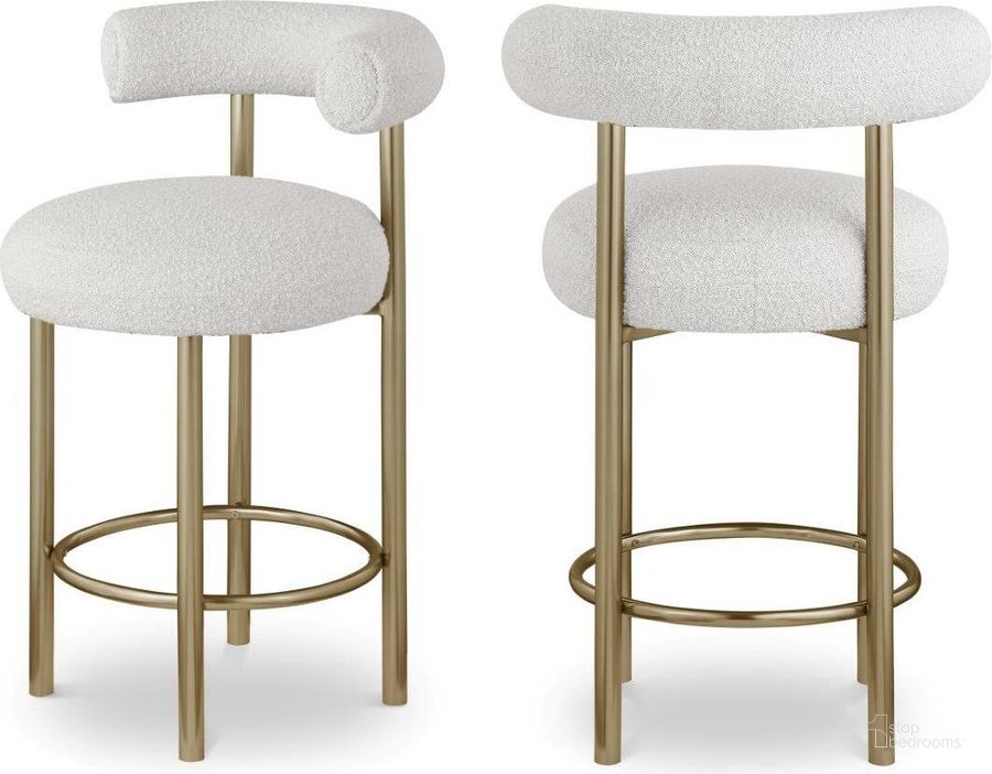 The appearance of Bordeaux Cream Boucle Fabric Stool Set of 2 547Cream-C designed by Meridian in the modern / contemporary interior design. This cream piece of furniture  was selected by 1StopBedrooms from Bordeaux Collection to add a touch of cosiness and style into your home. Sku: 547Cream-C. Product Type: Stool. Material: Iron. Image1