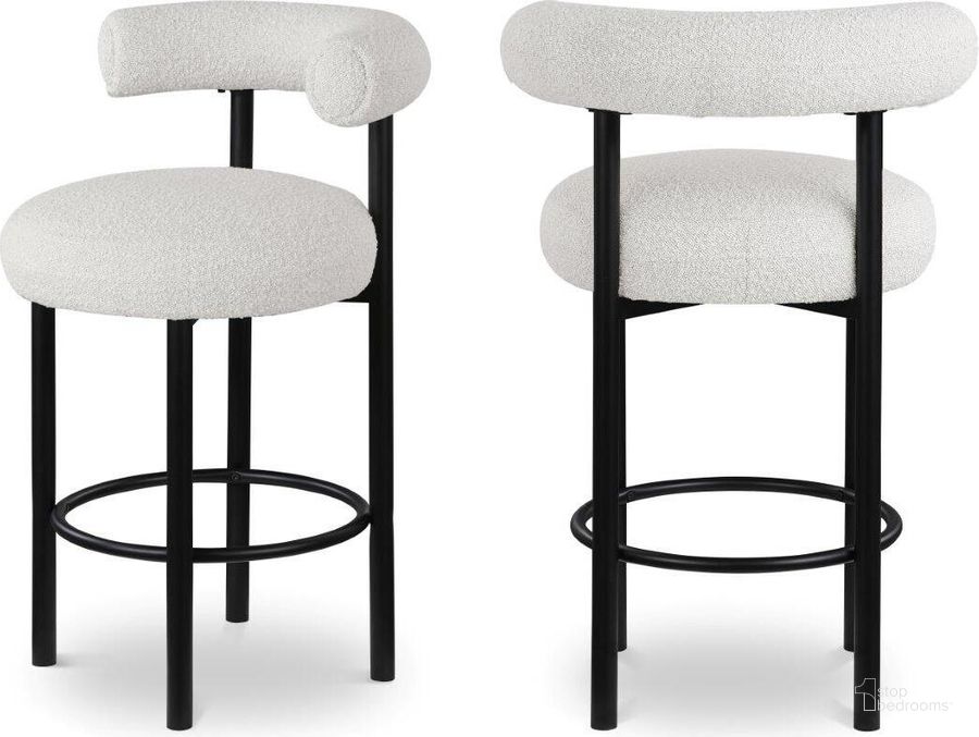 The appearance of Bordeaux Cream Boucle Fabric Stool Set of 2 551Cream-C designed by Meridian in the modern / contemporary interior design. This cream piece of furniture  was selected by 1StopBedrooms from Bordeaux Collection to add a touch of cosiness and style into your home. Sku: 551Cream-C. Product Type: Stool. Material: Iron. Image1