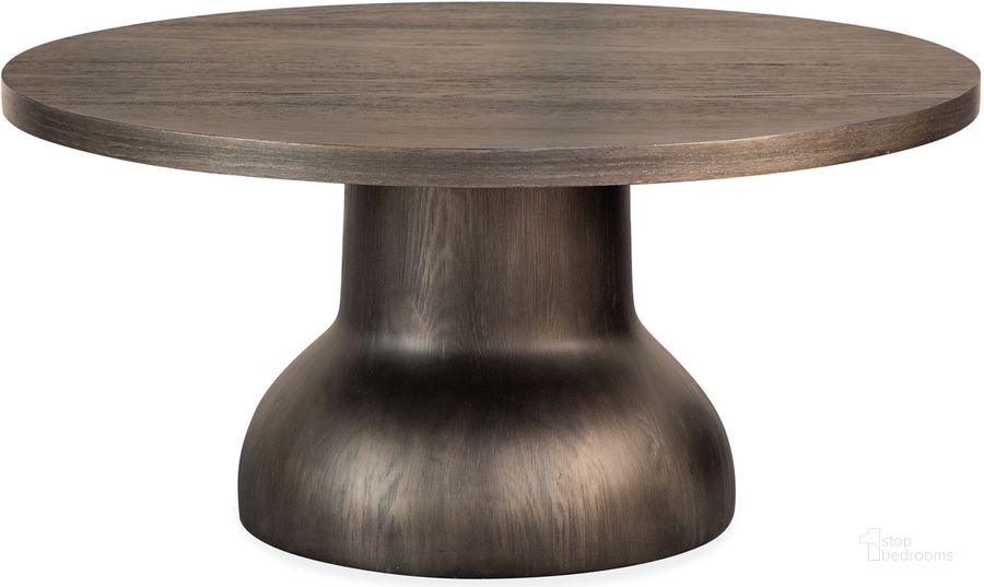 The appearance of Bosley Round Cocktail Table designed by Magnussen in the  interior design. This  piece of furniture  was selected by 1StopBedrooms from Bosley Collection to add a touch of cosiness and style into your home. Sku: T5762-45B;T5762-45T. Material: Wood. Product Type: Cocktail Table. Image1