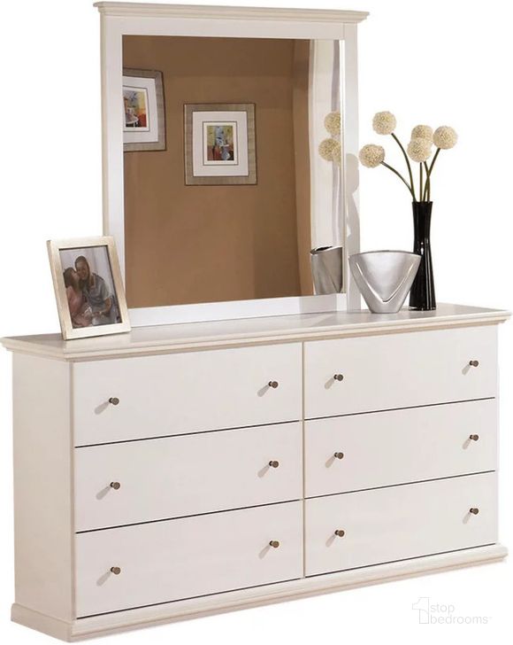 The appearance of Bostwick Shoals Dresser and Mirror In White designed by Signature Design by Ashley in the transitional interior design. This white piece of furniture  was selected by 1StopBedrooms from Bostwick Shoals Collection to add a touch of cosiness and style into your home. Sku: B139-31;B139-36. Material: Wood. Product Type: Dresser and Mirror. Image1