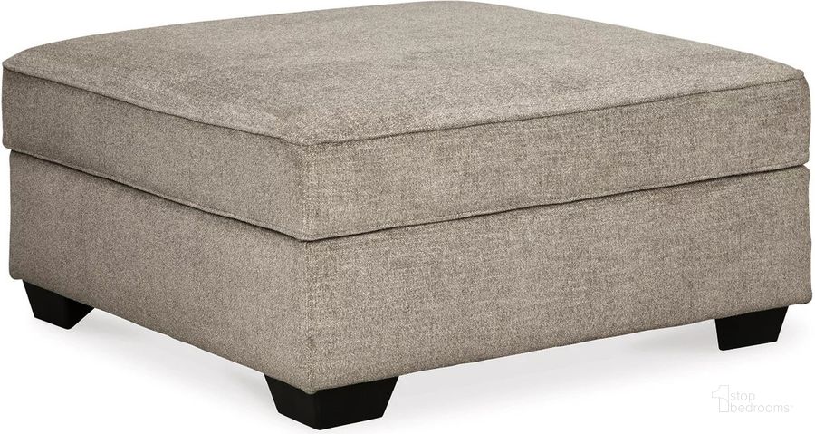 The appearance of Bovarian Ottoman with Storage In Stone designed by Signature Design by Ashley in the transitional interior design. This stone piece of furniture  was selected by 1StopBedrooms from Bovarian Collection to add a touch of cosiness and style into your home. Sku: 5610311. Material: Fabric. Product Type: Ottoman. Image1