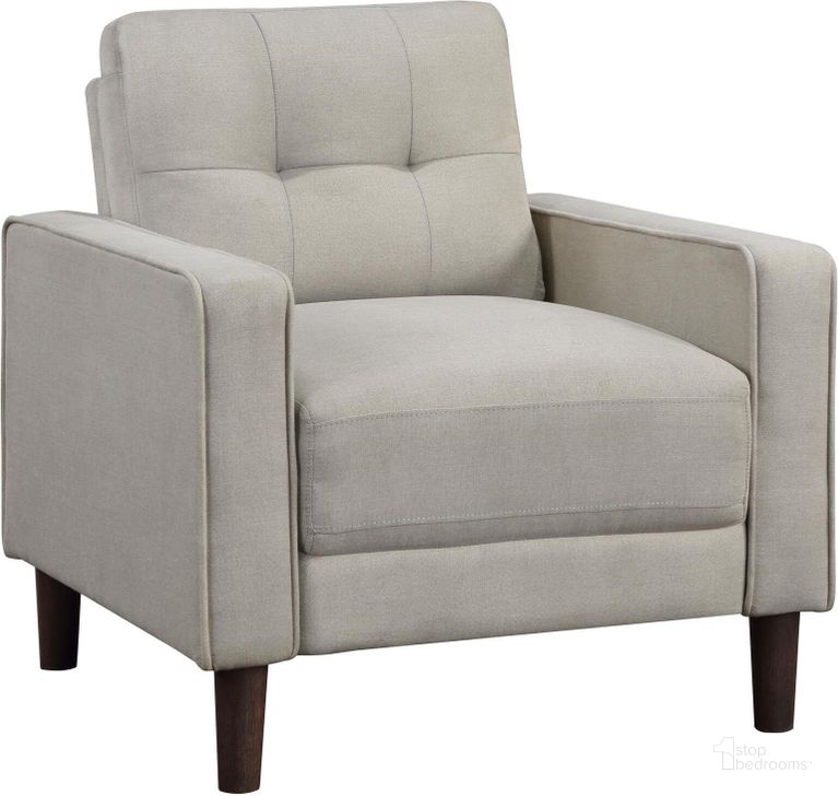 The appearance of Bowen Upholstered Track Arms Tufted Chair In Beige designed by Coaster in the transitional interior design. This beige piece of furniture  was selected by 1StopBedrooms from Bowen Collection to add a touch of cosiness and style into your home. Sku: 506787. Material: Upholstered. Product Type: Accent Chair. Image1