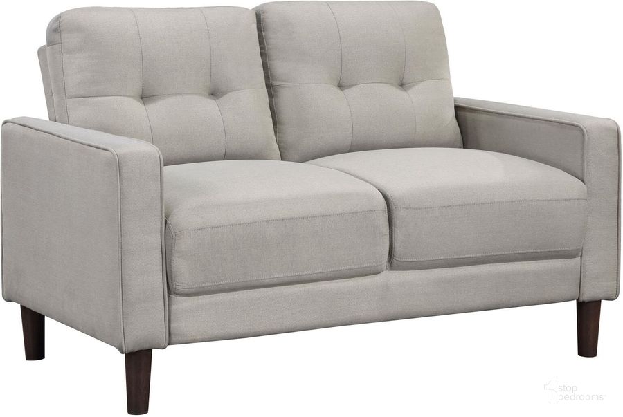 The appearance of Bowen Upholstered Track Arms Tufted Loveseat In Beige designed by Coaster in the transitional interior design. This beige piece of furniture  was selected by 1StopBedrooms from Bowen Collection to add a touch of cosiness and style into your home. Sku: 506786. Material: Upholstered. Product Type: Loveseat. Image1
