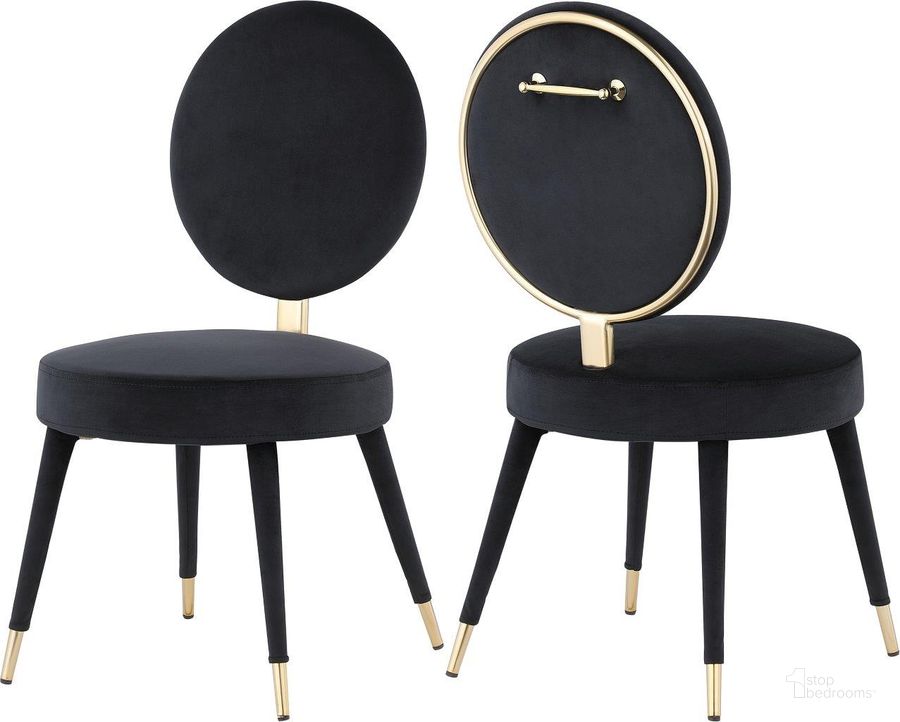 The appearance of Brandy Black Velvet Dining Chair Set Of 2 designed by Meridian in the modern / contemporary interior design. This black velvet piece of furniture  was selected by 1StopBedrooms from Brandy Collection to add a touch of cosiness and style into your home. Sku: 580Black-C. Product Type: Dining Chair. Material: Iron. Image1