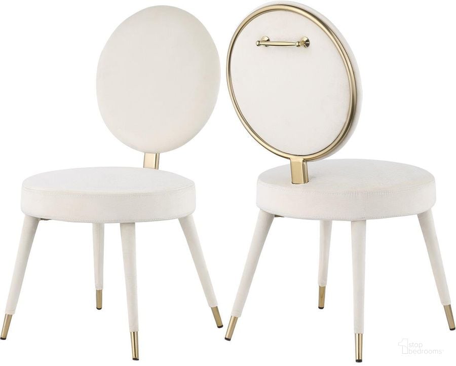 The appearance of Brandy Cream Velvet Dining Chair Set Of 2 designed by Meridian in the modern / contemporary interior design. This cream velvet piece of furniture  was selected by 1StopBedrooms from Brandy Collection to add a touch of cosiness and style into your home. Sku: 580Cream-C. Product Type: Dining Chair. Material: Iron. Image1