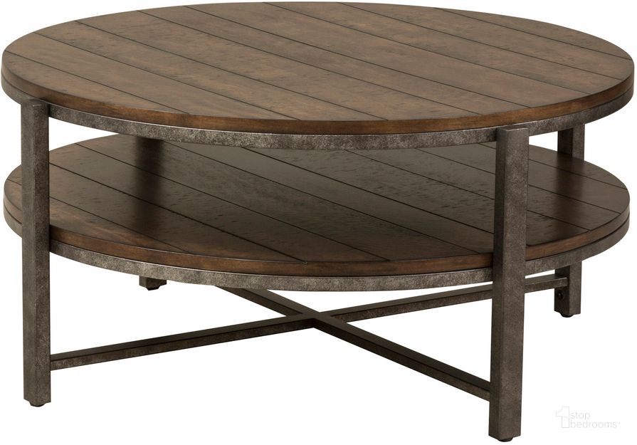 The appearance of Breckinridge Mahogany Spice with Pewter Metal Round Cocktail Table designed by Liberty in the transitional interior design. This brown piece of furniture  was selected by 1StopBedrooms from Breckinridge Collection to add a touch of cosiness and style into your home. Sku: 348-OT1010. Table Top Shape: Round. Material: Wood. Product Type: Cocktail Table. Image1