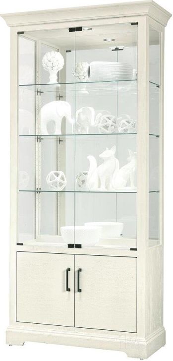 The appearance of Breindel Ii Curio Cabinet In Linen designed by Howard Miller in the transitional interior design. This cream piece of furniture  was selected by 1StopBedrooms from Breindel Collection to add a touch of cosiness and style into your home. Sku: 680746. Product Type: Curio Cabinet. Image1