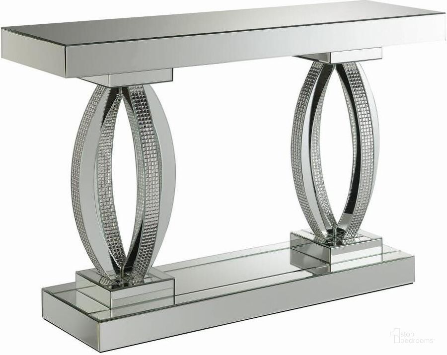 The appearance of Brentley Silver Sofa Table designed by Luxe Linea in the modern / contemporary interior design. This silver piece of furniture  was selected by 1StopBedrooms from Brentley Collection to add a touch of cosiness and style into your home. Sku: 722519B1;722519B2. Material: Glass. Product Type: Sofa Table. Image1