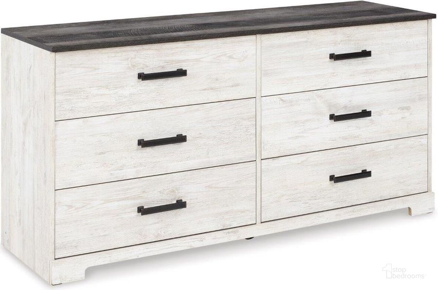 The appearance of Brettlyn White Wash/Charcoal Gray Dresser designed by Off 5th Home in the transitional interior design. This white wash/charcoal gray piece of furniture  was selected by 1StopBedrooms from Brettlyn Collection to add a touch of cosiness and style into your home. Sku: EB4121-231. Material: Wood. Product Type: Dresser. Image1