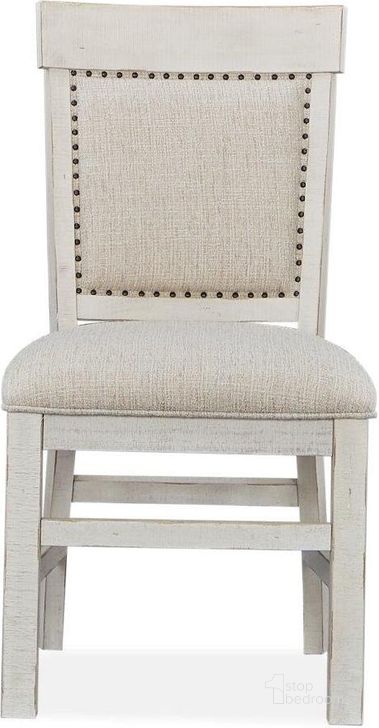 The appearance of Bronwyn Chalk White Upholstered Dining Side Chair Set Of 2 designed by Magnussen in the transitional interior design. This white piece of furniture  was selected by 1StopBedrooms from Bronwyn Collection to add a touch of cosiness and style into your home. Sku: D4436-63. Product Type: Side Chair. Material: Solid Pine. Image1