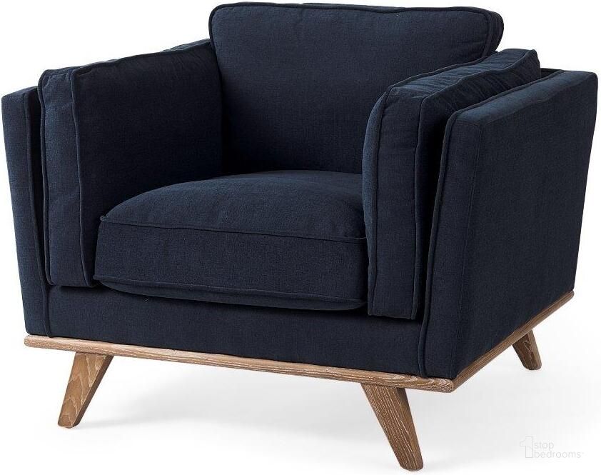 The appearance of Brooks Navy Blue Fabric Chair With Medium Brown Wooden Legs designed by Mercana in the modern / contemporary interior design. This blue piece of furniture  was selected by 1StopBedrooms from Brooks Collection to add a touch of cosiness and style into your home. Sku: 69618. Material: Wood. Product Type: Accent Chair. Image1