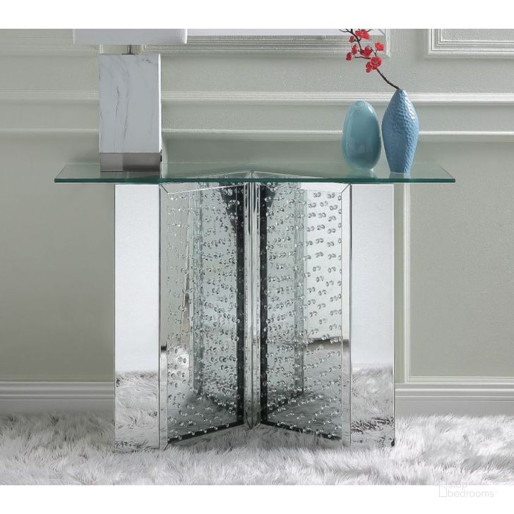 The appearance of Burrell Mirrored Console Table 0qb24374758 designed by Sterling Designs in the glam interior design. This mirrored piece of furniture  was selected by 1StopBedrooms from Burrell Collection to add a touch of cosiness and style into your home. Sku: 90510ST;90511GL. Material: Wood. Product Type: Console Table. Image1