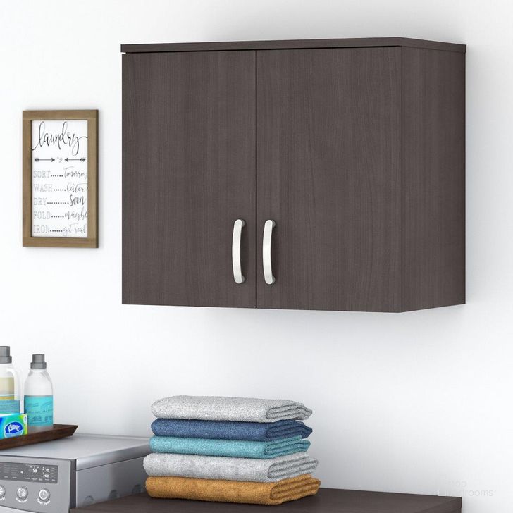 The appearance of Bush Business Furniture Universal Laundry Room Wall Cabinet with Doors and Shelves in Storm Gray designed by Bush Furniture in the modern / contemporary interior design. This dark gray piece of furniture  was selected by 1StopBedrooms from Laundry Storage Collection to add a touch of cosiness and style into your home. Sku: LNS428SG-Z. Product Type: Bathroom Storage. Image1