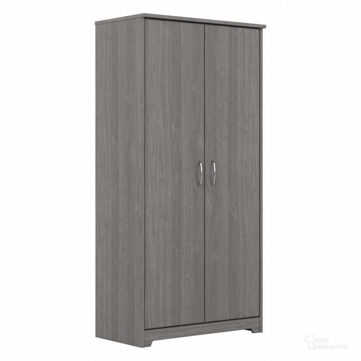 The appearance of Bush Furniture Cabot Tall Storage Cabinet with Doors in Modern Gray designed by Bush Furniture in the modern / contemporary interior design. This gray piece of furniture  was selected by 1StopBedrooms from Cabot Collection to add a touch of cosiness and style into your home. Sku: WC31399. Product Type: Storage Cabinet. Image1