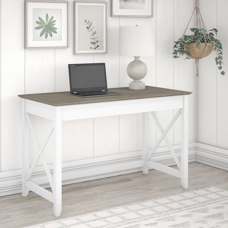 The appearance of Bush Furniture Key West 48W Writing Desk In Pure White And Shiplap Gray designed by Bush Furniture in the country / farmhouse interior design. This white and gray piece of furniture  was selected by 1StopBedrooms from Key West Collection to add a touch of cosiness and style into your home. Sku: KWD148G2W-03. Product Type: Writing Desk. Image1