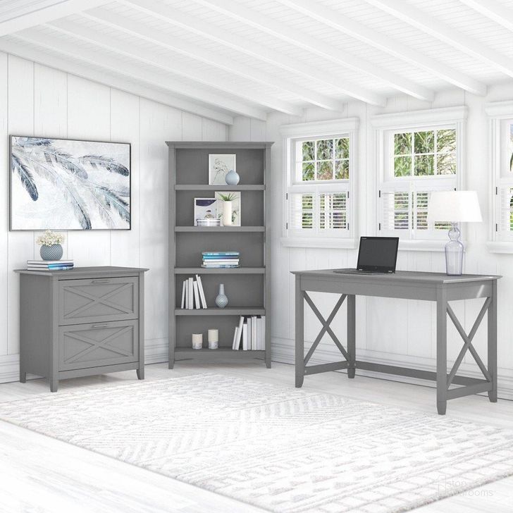The appearance of Bush Furniture Key West 48W Writing Desk With 2 Drawer Lateral File Cabinet And 5 Shelf Bookcase In Cape Cod Gray designed by Bush Furniture in the country / farmhouse interior design. This gray piece of furniture  was selected by 1StopBedrooms from Key West Collection to add a touch of cosiness and style into your home. Sku: KWS004CG. Product Type: Home Office Desk. Image1