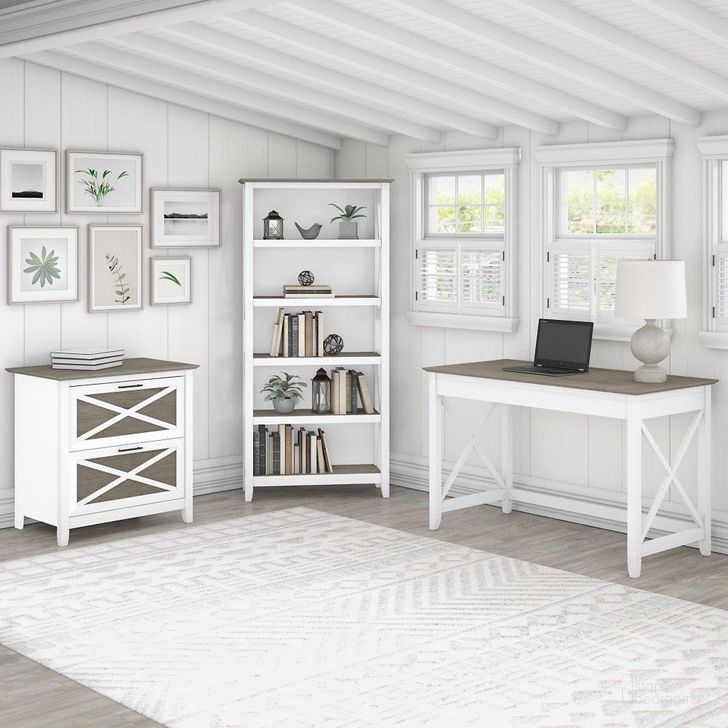 The appearance of Bush Furniture Key West 48W Writing Desk With 2 Drawer Lateral File Cabinet And 5 Shelf Bookcase In Pure White And Shiplap Gray designed by Bush Furniture in the country / farmhouse interior design. This white and gray piece of furniture  was selected by 1StopBedrooms from Key West Collection to add a touch of cosiness and style into your home. Sku: KWS004G2W. Product Type: Home Office Desk. Image1