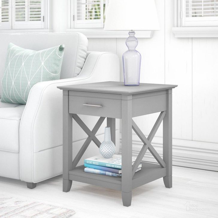 The appearance of Bush Furniture Key West End Table With Storage In Cape Cod Gray designed by Bush Furniture in the country / farmhouse interior design. This gray piece of furniture  was selected by 1StopBedrooms from Key West Collection to add a touch of cosiness and style into your home. Sku: KWT120CG-03. Product Type: End Table. Image1