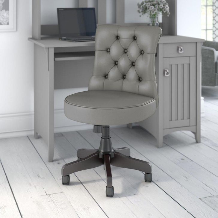 The appearance of Bush Furniture Salinas Mid Back Tufted Office Chair in Light Gray Leather designed by Bush Furniture in the country / farmhouse interior design. This light gray piece of furniture  was selected by 1StopBedrooms from Salinas Collection to add a touch of cosiness and style into your home. Sku: SAL011LG. Product Type: Office Chair. Image1