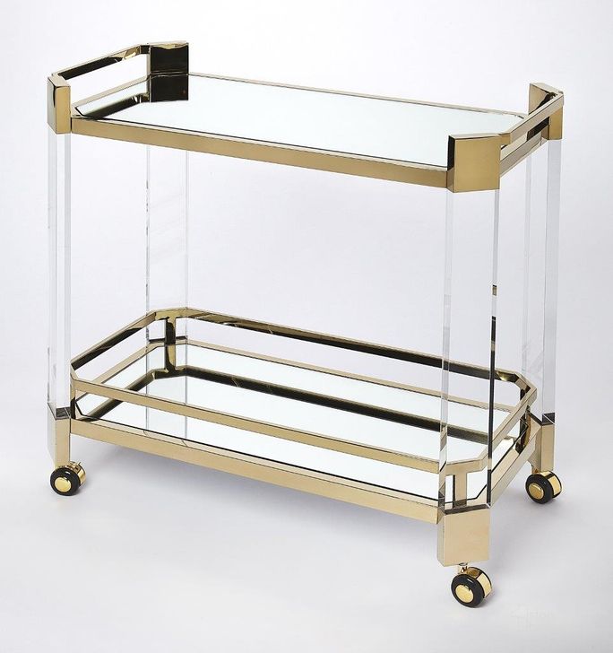 The appearance of Butler Charlevoix Acrylic and Gold Serving Cart designed by Butler Specialty Company in the modern / contemporary interior design. This gold piece of furniture  was selected by 1StopBedrooms from Loft Collection to add a touch of cosiness and style into your home. Sku: 5408335. Product Type: Serving Cart. Material: Stainless Steel. Image1
