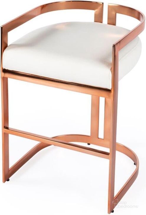 The appearance of Butler Clarence Rose Gold & White Faux Leather Counter Stool designed by Butler Specialty Company in the modern / contemporary interior design. This gold piece of furniture  was selected by 1StopBedrooms from Butler Loft Collection to add a touch of cosiness and style into your home. Sku: 5377422. Product Type: Barstool. Material: Polyurethane. Image1